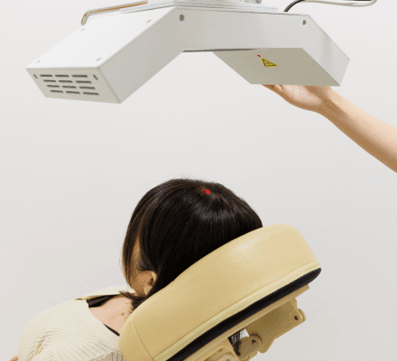 非接触振動圧刺激装置での施術イメージ